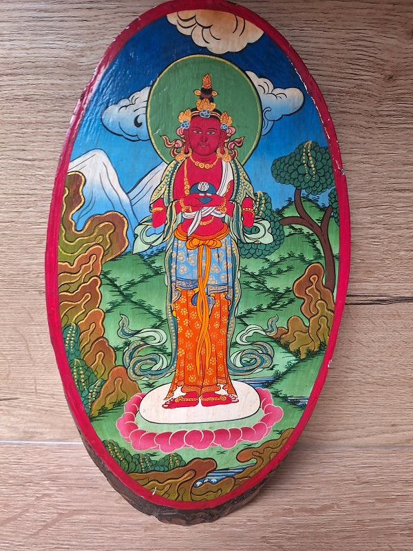 Peinture népalaise sur une tranche de bois d'Avalokiteshvara, bodhisattva de la compassion dans le bouddhisme Mahayana.