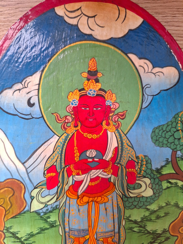 Peinture népalaise sur une tranche de bois d'Avalokiteshvara, bodhisattva de la compassion dans le bouddhisme Mahayana.