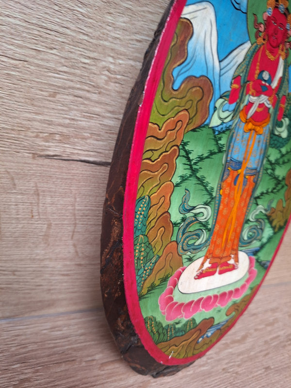 Peinture népalaise sur une tranche de bois d'Avalokiteshvara, bodhisattva de la compassion dans le bouddhisme Mahayana.